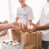 cropped-shot-of-volunteers-with-food-and-drinks-for-charity.jpg